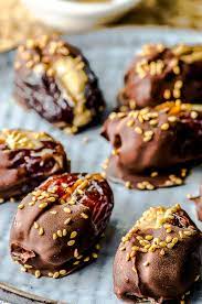 Stuffed Dates With Tahini Dipped In Chocolate Recipe Date Recipes Desserts Desserts Food