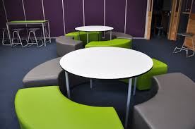 Contemporary Comfort And Design Quarter Circle Ottomans And Round Whiteboard Tables Together Create Learning Hubs For Group Whiteboard Table Table White Board