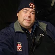 Frontline Ambulance Service Lawrence and old school stretcher usage