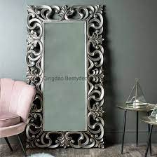 Beveled mirrored glass is bordered by slim stainless steel with a soft nickel finish. China Antique Silver Large Baroque Style Polyurethane Decorative Floor Mirror China Mirror Wall Home Decor Luxury