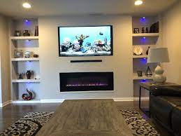 Blue Lights Under My Wall Unit With Electric Fireplace Fireplace Tv Wal Blue Living Room Wall Units Living Room Decor Fireplace Feature Wall Living Room
