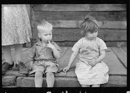 A black and white photo of two young children. Ohio during Great  Depression.