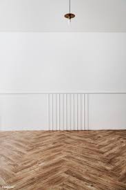 a room with a whte wall and parquet premium image by rawpixel com jira light green walls modern home furniture light pink walls