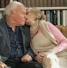 Touching moment Prunella Scales, 91, who has dementia, plants a tender kiss 