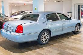 Image result for Light Ice Blue 2005 Town Car