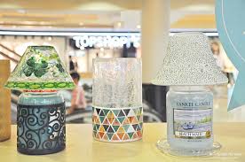 So make sure that you're burning your candle somewhere away from flammable objects, and again that you never leave a burning candle unattended. Sara Wanderlust Review Yankee Candle Votive Sampler