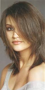 Medium layers with heavy, straight bangs. 47 Fresh Hairstyle Ideas With Side Bangs To Shake Up Your Style