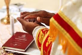 Blessing Of The Rings During Indian Orthodox Wedding At Dreams Tulum Mexico Jonathan Cossu Photographer The Globe