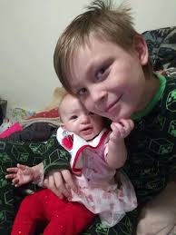 Family remembered at candlelight vigil