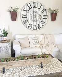 The terms modern and farmhouse might have once seemed like opposites, but this combination of design styles is now trending in a big way. Farmhouse Clock With Wall Planters For Kitchen Wall Farm House Living Room Farmhouse Decor Living Room Clock Wall Decor