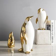Incorporate some penguin flair into your coastal home decor. Hot Gold Plated Penguin Family Porcelain Decoration Home Decorations Crafts Ceramic Crafts Electroplating Valentine S Gift Gift Gifts Gift Craftgift Decoration Aliexpress