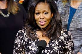 It is a metal hook, often around crochet hook size g, with the eye of a needle at the end. Michelle Obama Hooked On Knitting Thinking About Retirement Dtnext In