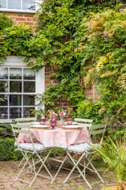 Large coastal side patio in sussex with a fireplace, concrete slabs and no cover. 75 Beautiful Small Patio Ideas Designs July 2021 Houzz Uk