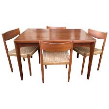 Danish Modern Extendable Teak Dining Table With Woven Chairs Modern Dining Room Set Danish Modern Dining Room Interior Design Dining Room