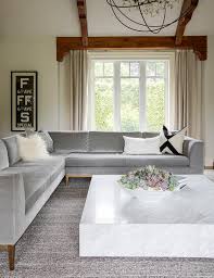 Use the low coffee table on its own or build a complete living room furniture set with the matching cyra end tables, 60w tv stand and console table (coordinating items sold separately). Gray Velvet Sectional With Marble Coffee Table Transitional Living Room