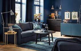 Founded atop sleek, clear chrome feet, this marrow hickory modern 2 pieces living room set is crafted with a solid birch frame and filled with foam for a bit of cushioning as it seats up. A Gallery Of Living Room Inspiration Blue Living Room Living Room Furniture Inspiration Dark Blue Living Room