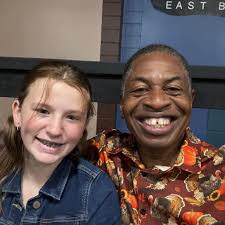 consecutive daily running streak of 1600 days with 4.97 mile average