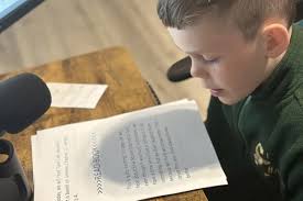 Young podcaster emulates media priest Father Mike Schmitz with 'Kid's Bible  in a Year'