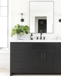 Black And White Vanity Ideas With No Need For Ornamentation Or Embellishments The Knowles Mirror Makes It Statement With An Ex Black Vanity Bathroom Black Bathroom Black Cabinets Bathroom