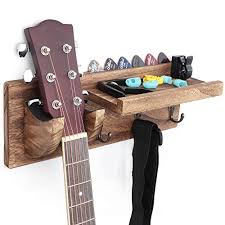 Excellent construction and easy to mount on the wall. How To Hang A Guitar On The Wall With A Diy Holder
