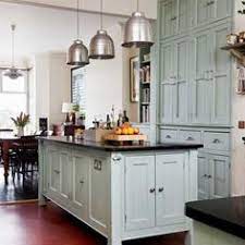 Long expanses of white caesarstone countertops are warmed up by the island's walnut base and the oak floors. 14 Modern Kitchen Ideas In Old Homes Modern Kitchen Kitchen Design Home Kitchens