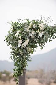 Wooden Wedding Arch With White Flowers And Greenery Wedding Arch Flowers Wedding Arch Greenery White Wedding Arch
