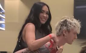 At the time, fox was married to brian austin green. Megan Fox Hitches A Ride On Mgk S Back For A Break From Her Stilettos Footwear News