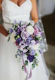 A pretty dried wedding bouquet of lunaria, pampas grass, baby's breath, dried daises and fern is a lovely idea for both a bride or bridesmaid. Purple Wedding Bouquets Arabia Weddings