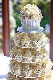 Totally Unique Wedding Cupcake Ideas Wedding Cakes With Cupcakes Cupcake Tower Wedding Cupcake Tower