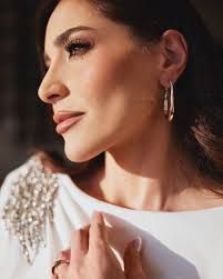 Moments before hitting the stage of @biaflebanon Grateful for the amazing  team who took care of my look 🤍 ••• Jewelry Tiffany & Co. Stylist  @jonymatta Dress Naja Saade Hair @tonyelmendelek @yorgoekhoury