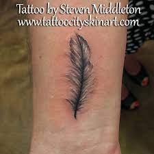 Light And Airy Simple Feather Wrist Tattoo By Steven Middleton Tattoo City Lockport Il Www Tattoocityskinart Com Feather Tattoos Feather Tattoo Arm Tattoos