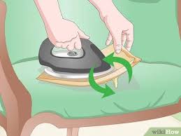 How do you clean a wax stain on a couch? 3 Ways To Remove Wax From Upholstery Wikihow