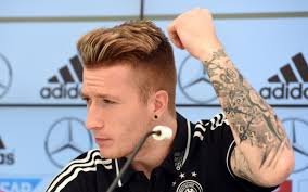 The marco reus style latest trend in hair styles for men and boys, the shaved sides and longer top that can be worm messy on top or long with bangs. Ten Things You Didn T Know About Arsenal Chelsea And Liverpool Target Marco Reus Caughtoffside