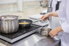 Do you have an electric, glass top stove? Chef Cooking Cereal Grain In Frying Pan With Oil On Electric Stock Photo Picture And Royalty Free Image Image 133928691