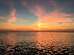Sunrise (or sunup) is the moment when the upper rim of the sun appears on the horizon in the morning. Long Dark Road Ahead Considering The Bright Side Of A Late Sunrise Cognoscenti