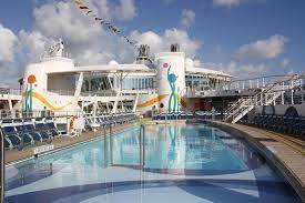 The allure of the seas was launched in december 2010 as the second ship of the oasis class and sails with its maximum of 5,400 passengers (double the new designed pool deck has more seating options and there will be more whirlpools at the upper deck as well as a solarium for adults. Allure Of The Seas Pool Deck Vacation Pool Deck Sydney Opera House