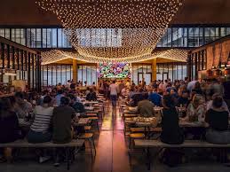 The Biggest Restaurant In Europe Is Like A Giant Indoor Block Party Paris Food Market Paris Food Food Market