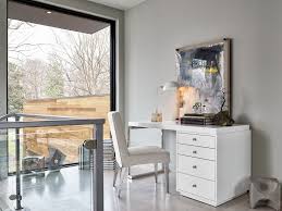 This faux live edge desk is a smoothed over live edge on all sides with stylish, rustic, iron legs. Modern Whitley Writing Desk Universal Furniture