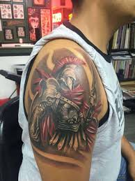 After all, the bible says in revelation19:16 that jesus has a tattoo on his thigh, and he has on his robe. 50 Powerful God Of War Tattoos Inspirational Tattoo Ideas