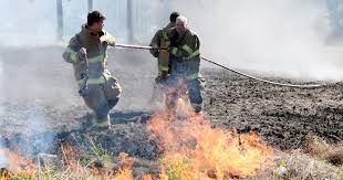 Photos: Lafayette Firefighters battle grass fire near Westwood Village  Shopping Center