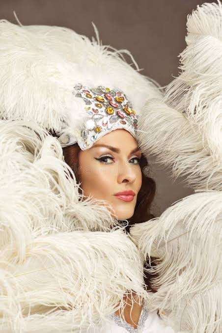 Glamorous Showgirl Portrait with White Ostrich Feathers Stock Image - Image  of cabaret, glamour: 438308183