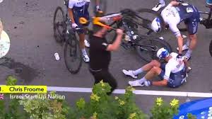 The tour de france will be filing a lawsuit against the spectator who caused a massive pileup when she stepped onto the road in the first stage of the race on saturday. N5bfs4odecdsfm