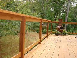 A Leading Minnesota Deck Builder Glass Railing Deck Deck Designs Backyard Wood Deck Railing