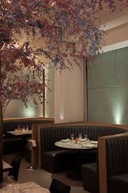 It S Asian Cuisine Engineered By A Cuban Born And Raised Chef Done With A Latin Twist It Speak Restaurant Seating Restaurant Concept Wooden Dining Room Chairs