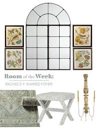 I can tell you what i wouldn't do here, a wall collage or decor on either side. Decorating Dilemmas Rachel S Foyer How To Decorate