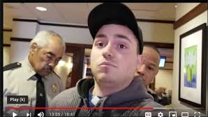 Detained for trespassing in Louisa County public building