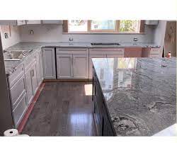 The granite also features dark brown speckling across the slab. Quality China Viscont White Granite Slabs For Kitchen Countertop Flooring Wall Floor China Viscont White Granite White Granite