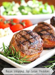 This steak diane recipe is beef tenderloin medallions that are seared and coated in a savory mushroom sauce. Bacon Wrapped Top Sirloin Medallions Melissassouthernstylekitchen Com