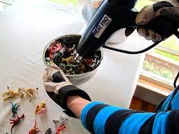 How To Make An Upcycled Plastic Animal Toy Bowl Homejelly Plastic Animals Pet Toys Melted Plastic Art