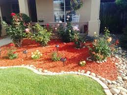 What To Do With River Rocks And Wood Chips Mulch Landscaping Backyard Landscaping Wood Chips Landscaping